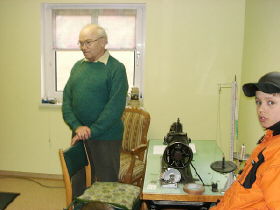 Mr Preißler with a sewing machine